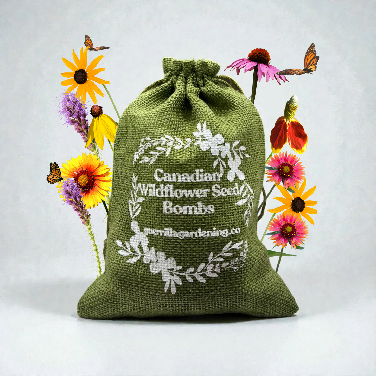 Green burlap bag containing the ‘Butterfly Seed Bombs’ mix. Surrounded by wildflowers (black-eyed Susans, coneflowers) and monarch butterflies in flight, these seed bombs are designed to attract butterflies.